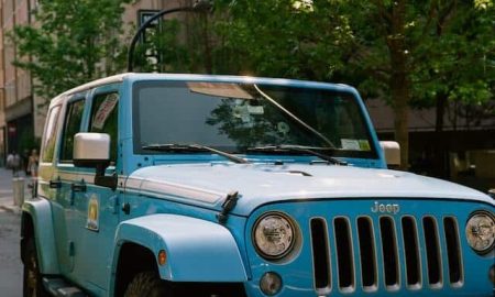 blue_jeep_wrangler_with_white_hardtop.jpeg