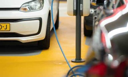 hybrid_car_charging_at_parking.jpeg