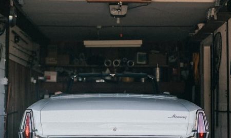 car_in_garage_with_old_engine_oil.jpeg