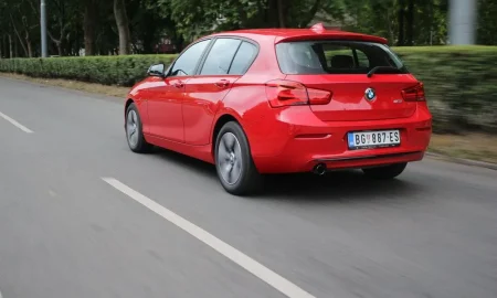 red_bmw_116i_test_drive.webp