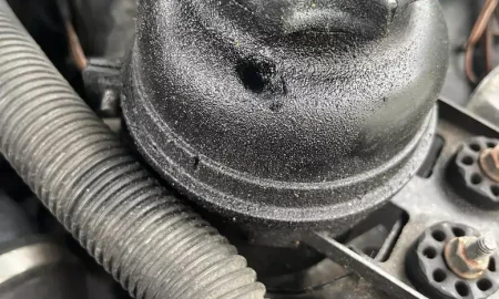 power_steering_fluid_reservoir.webp